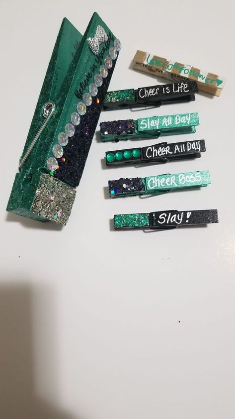 All About Cheer Pins | These 6" jumbo pins are so cool | Facebook Pins For Cheer Comps, Cheer Pins For Backpacks Diy, Cheer Pegs Ideas, Cheer Clothes Pins Ideas, Cheer Competition Clothespins, Cheer Competition Pins, Cheer Clip Ideas, Cheer Close Pin Ideas, Cheer Comp Pins