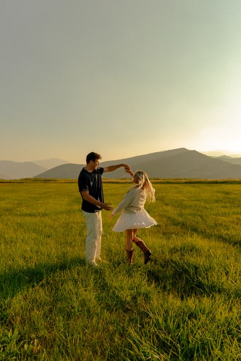 Twirling Engagement Photos, Spinning Engagement Photo, Country Field Engagement Photos, Couple Twirling Photo, Couple Spinning Around, Couples Photo Shoot In Field, Dreamy Couples Photoshoot, Professional Photoshoot Ideas Couples, Apple Picking Engagement Photos