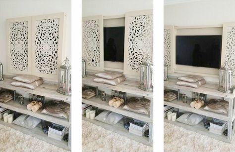 Hidden TV ideas: Check out this inspirational roundup of ideas to help you elegantly decorate around your TV with art, accent walls and other ideas.    #Eye-Candy, #Inspiration, #tv, #decorating, #entertainment-cabinet, #entertainment, #television, #disguise, #camoflage, #DIY, #How-To, #decor, #Curbly-Original, #Roundup Hidden Tv Ideas, Hide Tv, Ruang Tv, Tv 65, Tv Ideas, Tv Wall Cabinets, Hidden Tv, Entertainment Cabinet, Living Room Shelves