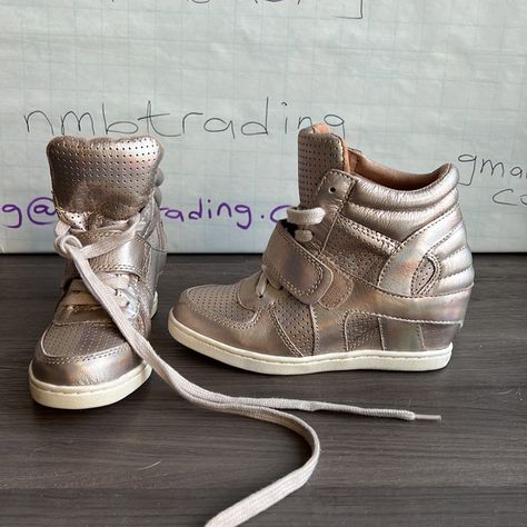 - Designer = Ash - Size = Eur 32. Trunk 37 - Msrp = $180 - Ash Light Champagne Color Leather Babe Bis Kid’s Size 32 Hidden Wedge Sneakers - Measured Underneath Outsole From Front Tip Of Shoes To Back Tip Of Heel To Give An Estimate Of Size Length = Approximately 20.5cm - Height Measured At Top Tip Of Sneakers To Bottom Tip Of Outsole = 13cm Trunk 37 Sneaker Heels Outfit, Stylist Closet, Colorful Wedges, Ash Sneakers, Heel Sneakers, Hidden Wedge Sneakers, Ash Shoes, Heels Sneakers, Leopard Sneakers