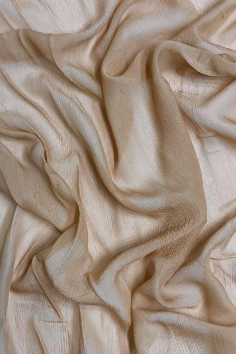 Sand Silk Heavy Crinkled Chiffon HCD-032 Fabric is 100% silk fabric with a pronounced crinkled texture. The word "chiffon" is French in origin and means "cloth". Our Silk Crinkled Chiffon comes in a wide range of colors, and it is utilized for bridal, eveningwear, overlays, lingerie, pants, blouses. Purchase Sand Silk Heavy Crinkled Chiffon HCD-032 Fabric by the Yard at NY Designer Fabrics. The fabric measures 54 inches in width. Tan Silk, White Texture, Fabric Texture, Natural Texture, Style Board, Fabric By The Yard, Silk Fabric, Fabric Care, Halloween Shopping