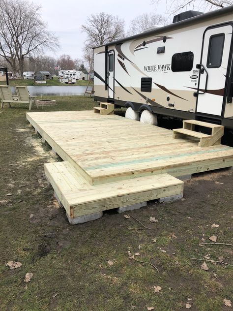 Deck plan from Menards, built by the Amish. Permanent Camper Deck Ideas, Trailer Deck Ideas Porch Designs, Deck For Rv Travel Trailers, Camper Outdoor Set Up Decor, Diy Camper Deck, Campground Ideas Campsite Decor, Camper Decorations Rv Decor, Diy Camper Porch Ideas, Camper Deck Ideas Campsite