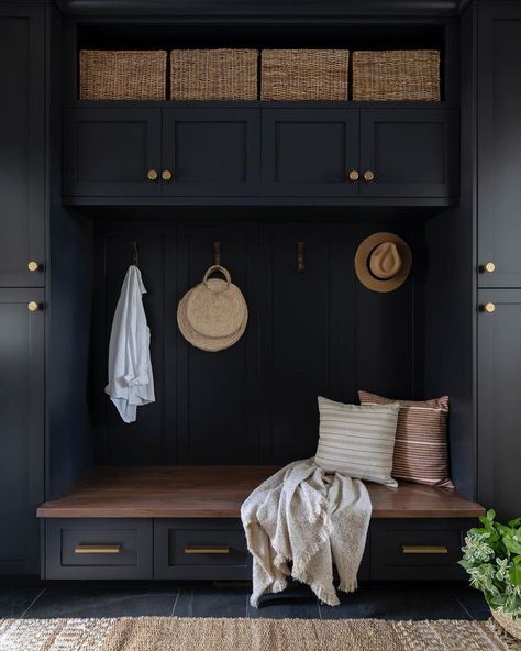 Mudroom | Design by Natalia Avalos Interiors | Spring has sprung and what better way to start the season than by decluttering your space? Boxes and baskets keep scattered items tucked away while providing storage and style! 🌼🌷🧺 Happy #SpringCleaning Black And Wood Mudroom, Witching Hour Benjamin Moore, Black Mudroom, Entryway With Bench, Mudroom Cabinetry, Mud Bench, Entrance Storage, Small Mudroom, Small Mudroom Ideas