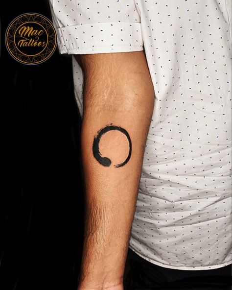 Enso is the Japanese word for the circle and a symbol closely related to Zen Buddhism. The enso symbolises absolute enlightenment, strength, elegance, the universe and the void . Inked at @mac_tattoos_original #hauzkhas For appointments do call or what’s app us on : +91 8851 012 863 +91 7042 130 654 Thanks for looking 😊 #ensotattoo #forearmtattoo #buddhatattoodesign #japanesetattoos #smalltattoosformen #delhitattoos #delhitattooshop #besttattooartistindelhi #besttattooindelhi Void Tattoo, Enso Symbol, Enso Tattoo, Buddha Tattoo Design, Japanese Lacquerware, Japanese Word, Zen Buddhism, Small Tattoos For Guys, The Void