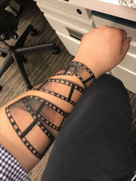 Film Strip Tattoo Sleeve, Film Reel Tattoo Design, Film Tape Tattoo, Film Slate Tattoo, Filmstrip Tattoo, Movie Theater Tattoo, Film Photography Tattoo, Movie Film Tattoo, Movie Lover Tattoo