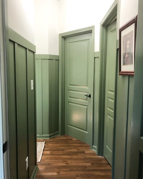 Green Trim And Doors, Green Bedroom Door, Green Door Interior, Green Doors Interior, Green Interior Doors, Parisian Hallway, Indoor Door Colors, Stair Moulding, Colourful Doors