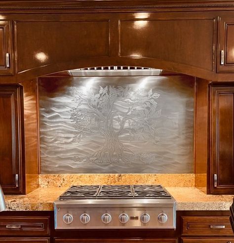 Life Tree Backsplash. | SpectraMetal Stainless Steel Backsplash Behind Stove, Behind Stove Backsplash Ideas, Stove Backsplash Ideas, Behind Stove Backsplash, Stainless Steel Kitchen Backsplash, Metal Backsplash Kitchen, Metal Backsplash, Steel Life, Black Stainless Steel Kitchen