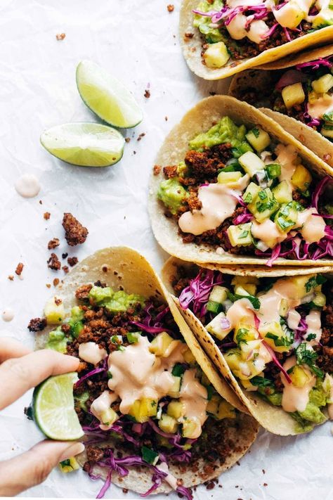 Walnut Chorizo Tacos with Pineapple Salsa! Spicy walnut/cauliflower meat, fresh guacamole, tangy slaw, and a homemade pineapple salsa. My favorite tacos! #vegan #vegetarian #plantbased #meatless #tacos #dinner #recipe | pinchofyum.com Cauliflower Meat, Walnut Chorizo, Meatless Tacos, Tacos Dinner, Tacos With Pineapple Salsa, Tangy Slaw, Tacos With Pineapple, Chorizo Tacos, Tacos Vegan