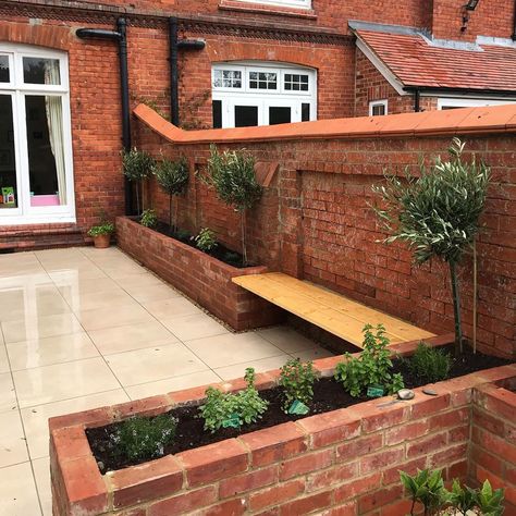 Brick Wall In Garden Ideas, Red Brick Wall Front Garden, Red Brick Garden Wall Ideas, Garden With Brick Wall, Planters On Brick Wall, Brick Garden Planters, Courtyard Brick Wall, Brick Garden Building, Red Brick House Patio Ideas