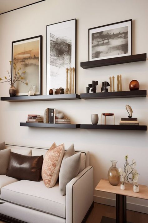 Infuse elegance into any room with floating shelves that blend function and style effortlessly. 🌟 Whether you're displaying your favorite reads, cherished mementos, or just seeking to declutter, these shelves are your go-to solution. They not only save space but also serve as a stunning visual element. Looking for the best floating shelves to complement your decor? Check out our top picks that are perfect for sale now! #GoTinySpace #FloatingShelves Floating Shelves And Picture Wall, Modern Floating Shelves Living Room, Awkward Corner Space Living Room, Shelves Above Couch, House Refurbishment, Couch Wall Decor, Above The Couch, Wall Shelves Living Room, Gallery Shelves