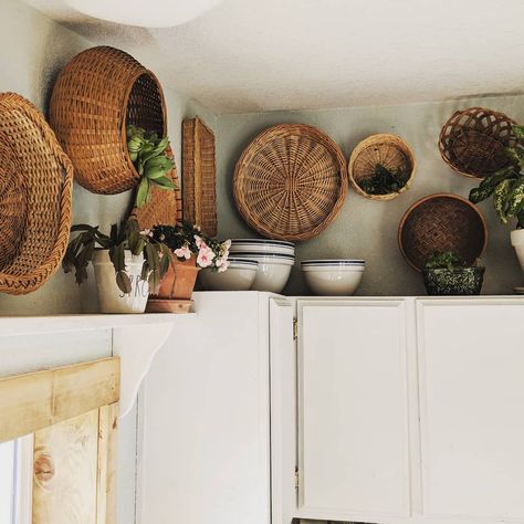 Baskets On Kitchen Cabinets, Boho Decor On Top Of Kitchen Cabinets, Basket Display Above Kitchen Cabinets, Kitchen Decor Cabinets Tops, Basket Wall In Kitchen, Wicker Baskets Above Kitchen Cabinets, Baskets Hung On Wall, Boho Cabinet Decor, Baskets On Top Of Cabinets