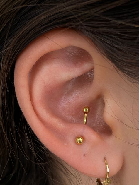 The anti-tragus is the new talk of the town – don't miss out!  🗣️  Anti-tragus piercing by @dannypierces  Soho, Union Square, and Williamsburg  11AM-9PM 7 DAYS A/W🕘 WALK-INZ OR BOOK ONLINE..📕 TATTOOS & PIERCINGS, NO ATTITUDE, NO MISERABLE HOOPS TO JUMP THROUGH....🚫  WALK-INZ WELCOME OR BOOK ONLINE AT  ⚔️livebytheswordtattoo.com⚔️ . . . . #livebytheswordtattoo #antitragus #piercer #piercing #traguspiercing #brooklyn Tragus And Anti Tragus Piercing, Tragus Tattoo, Piercing Anti Tragus, Surface Tragus, Anti Tragus Piercing, Piercings Ideas, Anti Tragus, Tragus Piercing, Piercing Ideas