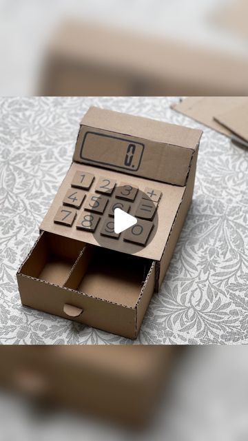 Cheryl Gavrielides on Instagram: "Cardboard cash register 💰   This has definitely been my longest lasting cardboard creation!!  And we use it regularly!!   If my children need something to enhance their play I will look for the cheapest way to get that resource/toy. And you can’t get cheaper than making it yourself! 😂  With a few bits of thick cardboard and a glue gun I believe you can make almost anything!!!   Right I’m looking for a challenge. I’ve already been asked to make a few things on the other app. (TT) So let me know what I should try and make next!!  #craftsforkids #cardboardcreations #cardboardcrafts #diyprojects #recycledart #cardboardbox #diy #fantasyhasreallynolimits #recycleandplay #diytoy #diytoysforkids #playroom #imaginativeplay #imaginaryplay #learnthroughplay #playid Upcycling, Things You Can Do With Cardboard, What To Do With A Cardboard Box Diy, Card Board Box Diy, How To Make A Cash Register Diy, Stuff To Make Out Of Cardboard, Diy Cash Register, Crafts With Cardboard Boxes, Card Board Crafts Diy Ideas