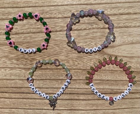 Melanie Martinez Portals album song inspired beaded bracelets, some with charms. Portals Melanie Martinez Bracelet, Melanie Martinez Concert Bracelets, Melanie Martinez Bracelet Idea, Portals Bracelet, Melanie Martinez Bracelet, Melanie Martinez Portals, Preppy Bracelets, Clay Bead, Bracelet Ideas