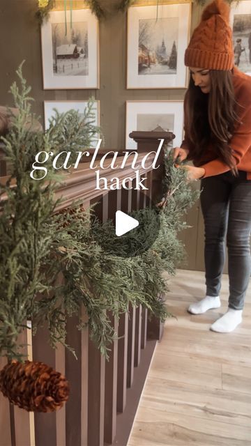 Ashley Hughes on Instagram: "The easiest way to hang garland- command hooks + binder clips👌🏻 your garland won’t be going anywhere! (Sometimes the binder clips aren’t necessary but if you find your garland sliding around at all, these will be a game changer for you!)

Garland + stockings linked in my Christmas highlight bubble + LTK link in my bio!😘
.
.
.
.
.
.
.
#garlandhack #christmasgarland #christmasdecor #stockings #hearthandhandwithmagnolia #hearthandhand #cottagesandbungalows #cottagesandbungalowsmagazine #christmascottage #cottagecore #englishcottage #englishcottagestyle" Hanging With The Hughes, Garland Over Picture On Wall, Hanging Christmas Stockings On Mantel, Hang Stockings On Stairs, Christmas Stocking On Stairs, Garland On Stairs Banisters, Garland With Hanging Ornaments, How To Hang Garland On Tree, Garland Banister Christmas