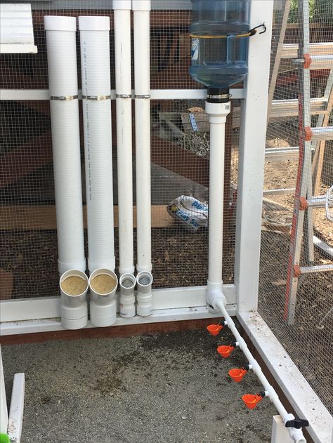 Chicken feeders and watering cup set up. DIY, PVC,  4 in chicken crumble feeder 2 in crushed oyster shell and grit feeders Rescue Chickens, Pvc Chicken Feeder, Reban Ayam, Chicken Feeder Diy, Cup Diy, Chicken Pen, Backyard Chicken Coop Plans, Chicken Waterer, Diy Chicken Coop Plans