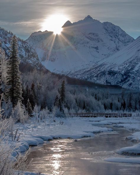 Sunrise Over The Chugach Mountains In Eagle River.  Photo By Brittney J Robles Photography  Love Alaska? Follow Us!> @ilovealaskafans  #ilovealaska #thealaskafrontier #alaska #eagleriver #chugachmountains #sunrise #riverlife #riverreflection #sunrays #snowyday #snowymorning #frostymorning #snowymountains #snowytrees #naturesbeauty #riverfishing #outdoorphotography Alaska Hunting, Eagle River Alaska, Snow Valley, Alaska Winter, Winter Landscape Photography, Alaska Mountains, Watching The Sunrise, River Painting, Snowy Trees