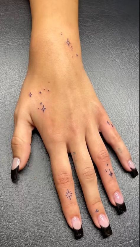 Tattoo design Pretty Hand And Finger Tattoos For Women, X Hand Tattoo, Tattoo Ideas Hands Women, Small Women Hand Tattoos, Cute Tattoos For Women Arms, Hand Stick And Poke Tattoo Ideas, Small Tattoos On Hand For Women, Small Hand Tattoos For Women Simple, Cool Dainty Tattoos