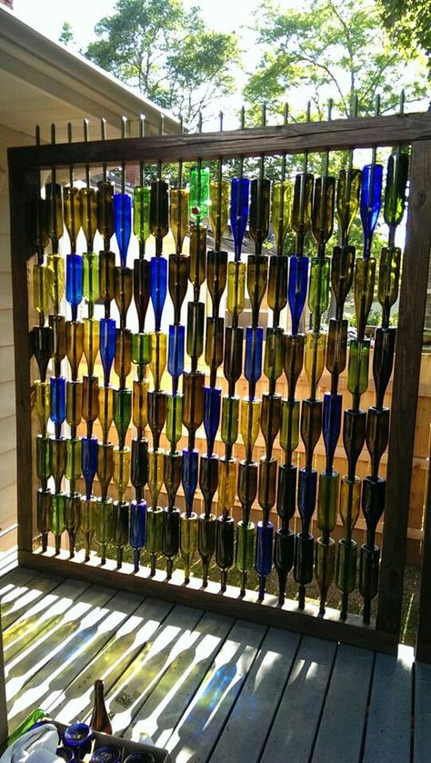 Wine bottle wall...framed with 4x4 lumber, using 7ft garden stakes for posts. Holes are drilled using an 11/16 inch drill bit with diamond dust tip (about $7 on ebay). Quite labor intensive, but worth the work! Wine Bottle Fence, Wine Bottle Wall, Bottle Trees, Bottle Tree, Storage Bathroom, Small Bathroom Ideas On A Budget, Small Bathroom Ideas Modern, Wine Bottle Art, Bottle Garden