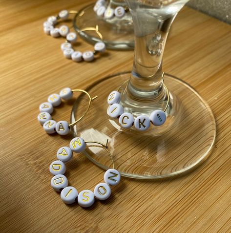 Wine Glass Tags Diy, Cottage Bachelorette, Bachelorette Glasses, Cottage Bachelorette Party, Drink Charms, Wine Glass Name Tags, Name Tag Wine Glasses, Cottage Party, Summer Wine Drinks