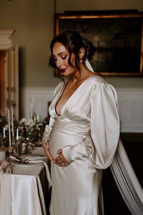 Satin maternity wedding dress for pregnant bride Dress For Pregnant Women Wedding, Winter Wedding Dress Pregnant, Courthouse Wedding Dress Maternity, Bride Pregnant Dress, White Long Sleeve Maternity Dress, Simple Maternity Wedding Dress, Wedding Dress While Pregnant, Courthouse Wedding Dress Pregnant, Pregnant Civil Wedding Dress