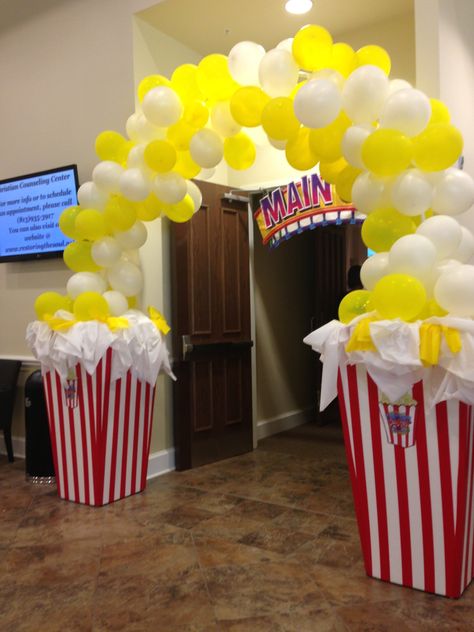 Popcorn Decorations Diy, Diy Popcorn Decorations, Popcorn Booth Ideas, Popcorn Theme Party Decoration, Popcorn Display Ideas, Popcorn Day Decoration, Popcorn Bucket Balloon Arch, Popcorn Theme Classroom, Popcorn Crafts