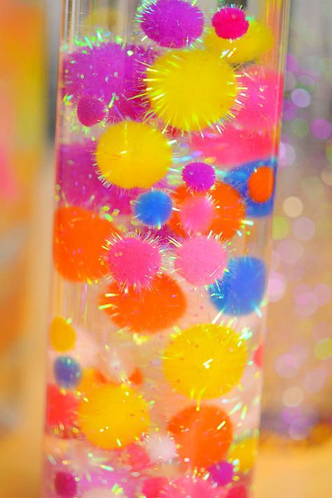 Relax Bottles Calm Down, Make Your Own Sensory Bottles, Pompom Sensory Bottle, Preschool Sensory Bottles Diy, Sensory Calming Bottles, Sensory Bottle Ideas For Preschoolers, Sensory Shaker Bottles, Feelings Sensory Bottles, Infant Sensory Bottles