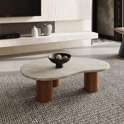 This solid wood cave stone round coffee table combines natural aesthetics with modern craftsmanship. With solid wood as the base, with cave stone quality, showing a simple but elegant style. The circular design is not only beautiful, but also can effectively save space, suitable for various sizes of living rooms and rest areas. The solidity of the solid wood frame combined with the natural texture of the cave stone tabletop adds a warm and peaceful feel to your living room. Aurora Craft Table Ba Oblong Coffee Table, Organic Modern Coffee Tables, Round Wood Coffee Table Decor, Round Stone Coffee Table Living Room, Stone Wood Coffee Table, Wood And Stone Coffee Table, Stone Round Coffee Table, Modern Organic Coffee Table, Organic Modern Coffee Table