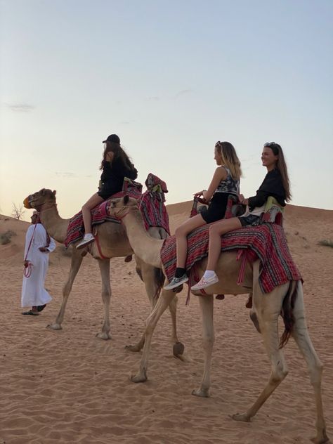 Camels, Dubai, desert, friends, sisters, traveling, vacation, what to do in Dubai, Dubai Aesthetic Camels, Dubai With Friends Aesthetic, Dubai Camel Ride Outfit, Dubai With Friends, Camel Riding Outfit, Dubai Inspo Pics, Friends Adventure Aesthetic, Camel Ride Outfit, Dubai Camel