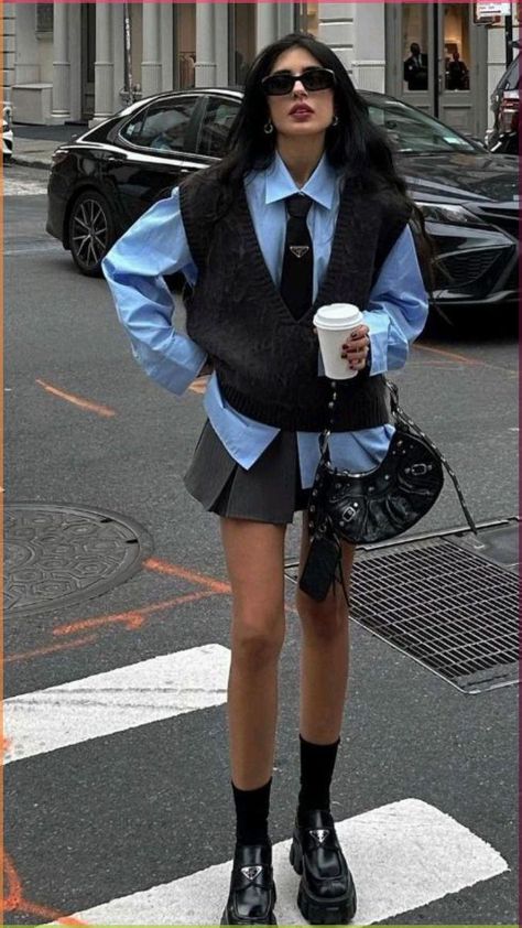 Blue button-up, tie, sleeveless sweater, mini skirt, socks, Prada loafers, Balenciaga Le Cagole bag | Back to office outfits, back to work outfits, office outfits, corporate attire, fall outfits, autumn outfits