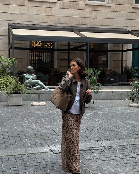 Fall in Italia is for leopard maxi skirt and suede bomber jacket 🤎 #falloutfit #fashioninspo #ootdshare #ootdfashion #autumnstyle #autumnstyles #italianstyle #frenchgirlstyle Maxi skirt, leopard print, suede jacket, bomber jacket, fall, fall outfit Outfit With Leopard Skirt, Leopard Skirt Outfit Fall, Leopard Maxi Skirt Outfit, Leopard Maxi Skirt, Leopard Skirt Outfit, Leopard Print Maxi Skirt, Suede Jacket Outfit, Leopard Maxi Skirts, Skirt Outfit Fall