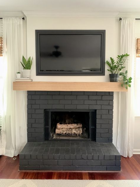 Fireplace Ideas Painted Brick, Black Fireplace Mantel Brick, Stain Brick Fireplace Black, Dark Wash Fireplace Brick, Dark Gray Painted Fireplace, Redone Brick Fireplace, Brick And Wood Fireplace Makeover, Painted Brick Fireplaces Black, Stain Fireplace Brick