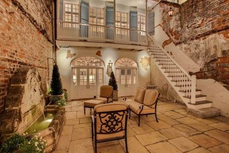 This Creole townhouse was built in 1830 and mixes French and Caribbean architectural elements. Our favorite feature? The stunning courtyard. View the listing on Zillow. French Colonial Homes, New Orleans Style Homes, French Colonial Style, New Orleans Decor, Creole Cottage, French Creole, Modern Courtyard, Courtyard Design, French Style Homes