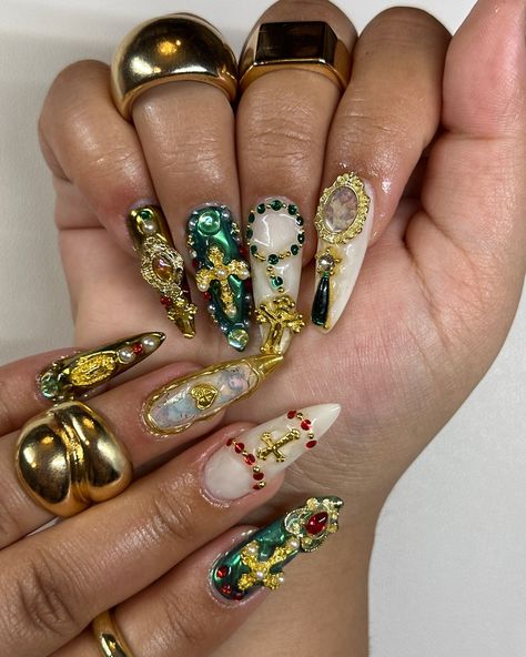 catholic core ⚜️ inspo @nailsbyaleeshah . . . catholic nails, sacred heart nails, religious nails, gold red and green nails, stiletto nails, gel x nails inspo 2024, #nailsnailsnails #nailart #gelxnails #naildesign #gelnails #gelmani #nailsofinstagram #gelx #nailtech #fypシ #explorepage✨ Catholic Nails Designs, Rosary Nails Designs, Religious Nails Designs, Catholic Nail Art, Kali Uchis Inspired Nails, Green Nails Stiletto, Jesus Nails Designs, Religious Nails, Sacred Heart Nails