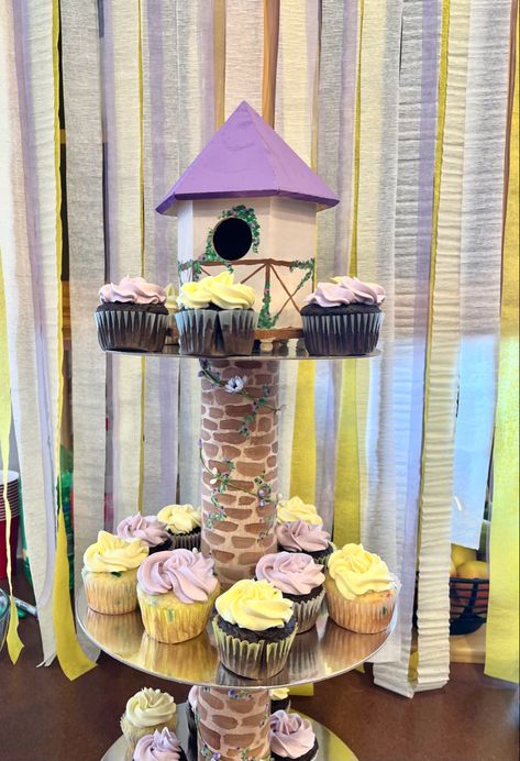 Tangled themed cupcake tower for tangled birthday party! SO EASY to make! All you need is 3 cake plates, two pringles cans and a wooden bird house, found at Walmart for $6. You can totally customize it and paint it to be whatever themed you want!! Rapunzel Cupcake Tower, Rapunzel Tower Cake, Tangled Cupcakes, Rapunzel Cupcakes, Tangled Tower, Rapunzel Tower, Rapunzel Birthday, Rapunzel Birthday Party, Cupcake Holder