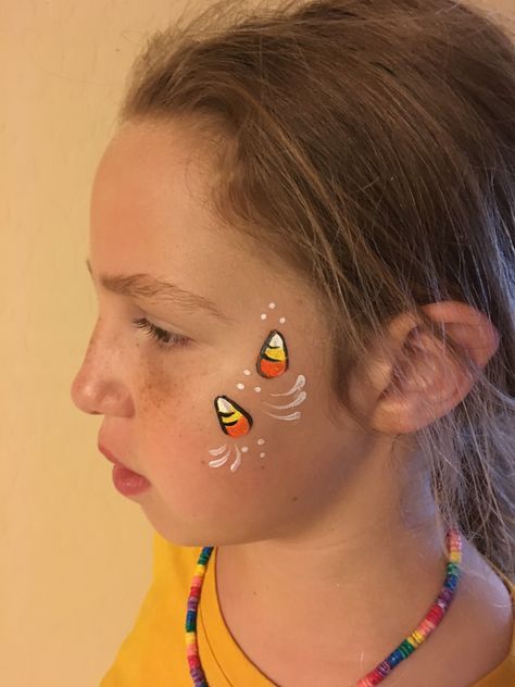 Halloween face painting Natal, Candy Corn Face Painting, Simple Fall Face Painting For Kids, Thanksgiving Face Painting, Candy Corn Face Paint, Halloween Cheek Face Paint, Small Halloween Face Paint, Easy Small Face Paint Ideas, Face Paint Halloween Easy