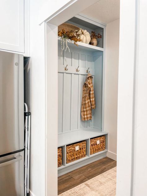 Another look at the mudroom from the kitchen Mudroom Off Of Kitchen, Mudroom In Hallway, Mudroom Into Kitchen, Fridge In Mudroom, Small Mudroom Built Ins With Bench, Add On Mudroom, Colored Mudroom Lockers, Porch To Mudroom Conversion, Painted Mudroom Cubbies