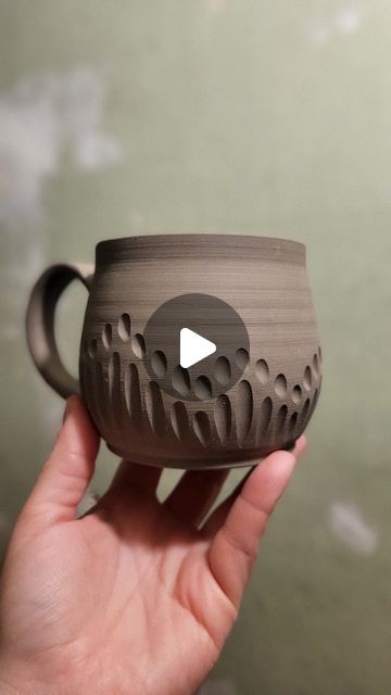 Aleatha Aiken-Sherrer on Instagram: "Carve a mug with me! 
This mug will be glazed in layers of colour that, if all goes to plan, will melt into the texture and break over the edges. 
.
.
Tools, just in case you're curious 😘
Loop tool by @dolantools
Carving tool by @diamondcoretools 
Stamp by 4clay.com
Hook/blade tool by @kempertoolschinoca 
.
.
.
#pottery #carving #clay #satisfying #gouge #dig #texture #ceramics #tools #Art #aleatha #aleathabean" Texture On Pottery Ideas, Carving Pottery Mugs, Carving Clay Ideas Patterns, Ceramics Carving Ideas, Mug Glazing Ideas, Carved Pottery Mugs, Carved Mugs, Carving Ceramics, Pottery Stamp