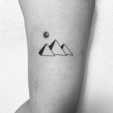 Minimalist Pyramids of Giza Tattoo by laylachenyz Tattoo Ideas Minimal, Egyptian Tattoo Designs, Pyramid Tattoo, Faith Tattoo On Wrist, Minimalist Tattoo Meaning, Paris Tattoo, Typography Tattoo, French Tattoo, Egypt Tattoo