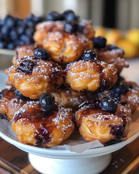 Find blueberry bliss in these Baked Blueberry Fritter Bites! Fresh blueberries baked into bite-sized fritters that are tender on the inside, crisp on the outside and coated in a sweet Blueberry Fritters Recipe, Avani Recipes, Blueberry Fritters, Cream Cheese Ball, Fritter Recipes, Blueberry Jam, Apple Fritters, Mini Muffins, Donut Recipes