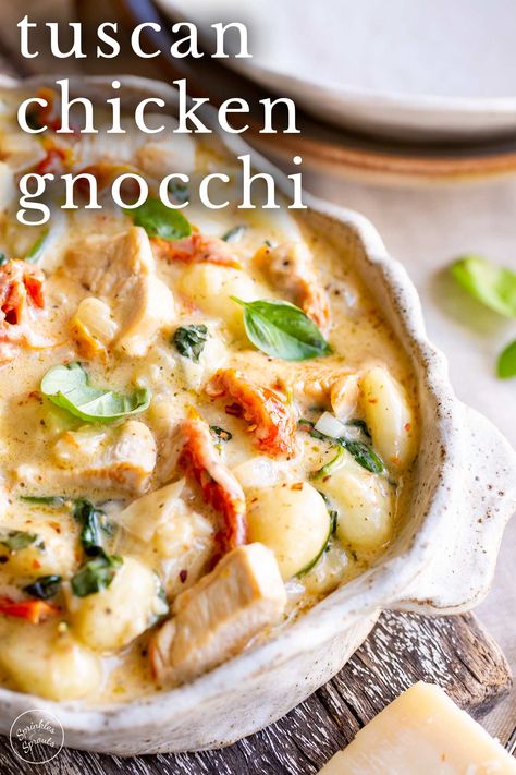 This Tuscan Chicken Gnocchi is a creamy one-pan meal for the whole family. But it is so simple that you can make it on a busy weeknight. Gnocchi is such a comforting dish; the soft fluffy pillows are wonderful, especially in this creamy, rich Tuscan cream sauce. This Tuscan Chicken Gnocchi is a nod to Italy rather than an Italian dish. Chicken, gnocchi sun-dried tomatoes, spinach, garlic, parmesan, and red pepper flakes are all mixed into creamy sauce. Tuscan Chicken Gnocchi, Gnocchi Dishes, Sprouts Recipes, Tuscan Garlic Chicken, Chicken Gnocchi, Family Dishes, Quick Food, Tuscan Chicken, Food Mood