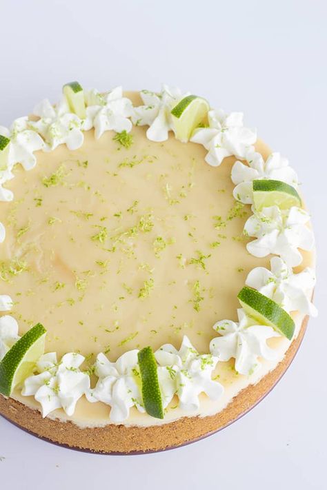 Key Lime Cheesecake - This key lime cheesecake is a fun spin on the key lime pie. It's so thick and creamy! Did I mention it has the perfect balance of sweet and tangy?! As far as the perfect summer dessert, this key lime cheesecake is the total package. #cookiedoughandovenmitt #cheesecake #cheesecakes #summerdessert #dessertfoodrecipes #dessertrecipes Best Key Lime Cheesecake Recipe, No Bake Key Lime Cheesecake, Key Lime Cheesecake Recipe, No Bake Key Lime, Key Lime Cheesecake, Key Lime Juice, Lime Cheesecake, Light Desserts, Lime Pie