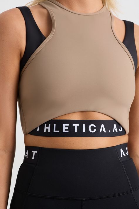 Shop the Cropped Layered Sport Tank 159 in Dune/Black online at AJE ATHLETICA. Free Express Shipping available in Australia Over $150. Easy and fuss-free returns. Sports Luxe Fashion, Sports Tops Women, Active Wear Runway, Gym Clothing Brands, Active Wear Fashion, Aje Athletica, Athleisure Inspiration, Gym Tops Women, Sportswear Details