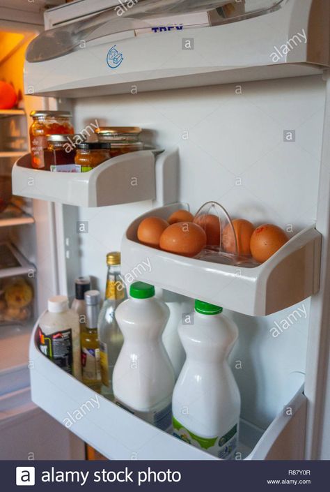 The inside shelves of a Fridge Door and ... Fridge Shelves, Fridge Door, Kitchen Cart, England, Shelves, Stock Photos, Home Decor