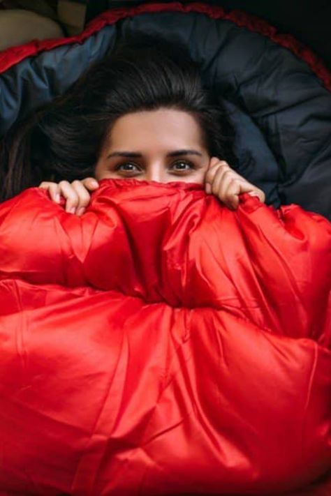 Having a warm and comfortable night's sleep in a sleeping bag can make or break a camping trip. If you want to know how to stay warm in a sleeping bag and never worry about waking up to a cold night again, then look no further! We'll show you 8 ways to not freeze in your sleeping bag so you can cozy up and have the best sleep ever. Follow us for more tips on camping trips and outdoor adventure! Camping Photoshoot, Michigan Camping, Best Sleeping Bag, How To Stay Warm, Can Cozy, Best Sleep, Cartoon Pictures, Sleeping Under The Stars, Camping Bag