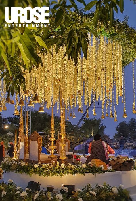 These Floral Hangings Are Gonna Change Your Wedding Game! #DecorGoals | WedMeGood Garden Wedding Decorations Indian, Elegant Wedding Drapery Ideas, Mandap With Bells, Indian Wedding Rajasthan, Hindu Backyard Wedding, Tree Mandap Decor, Rajasthan Wedding Venues, Green Mandap Decor, Indian Wedding Florals