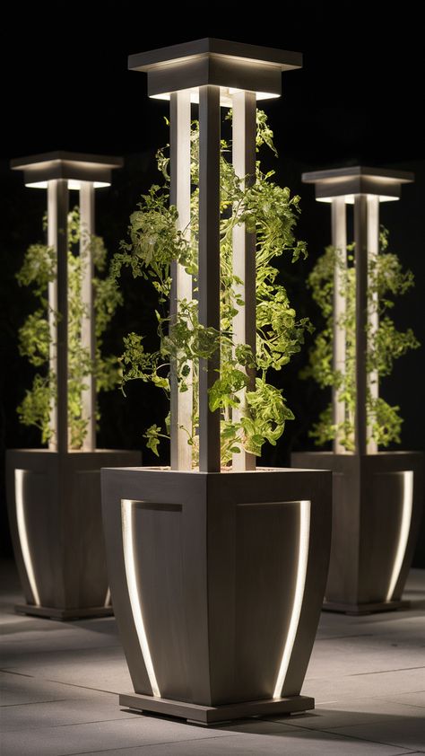 Explore elegant tall outdoor planter ideas that add sophistication to any garden or patio. Get inspired with designs that suit every style. Planter Pot Ideas Outdoor, Vertikal Garden, Outdoor Planter Ideas, Garden Lighting Ideas, Unique Patios, Front Yards Curb Appeal, Planters Ideas, Artificial Green Wall, Metal Planter Boxes