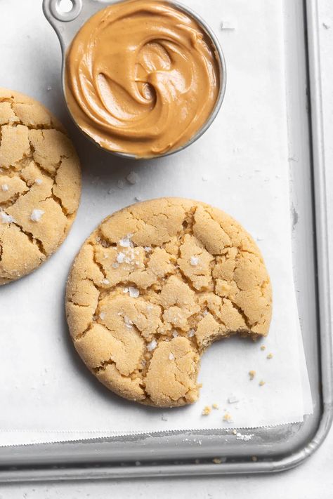 Whoever invented peanut butter cookies deserves a gold star. I mean, what’s not to love about a soft on the inside, crispy on the outside, salty, sweet peanut buttery cookie? Drool. You guys know I’m a chocolate chip cookie girl through and through, but I’ll never say no to a really good chewy peanut butter cookie recipe. | Browned Butter Blondie Chewy Peanut Butter Cookie Recipe, Salty Cookies, Classic Peanut Butter Cookies, Chewy Peanut Butter Cookies, Honey Cookies, Peanut Butter Cookie, Browned Butter, Peanut Butter Cookie Recipe, Butter Cookie