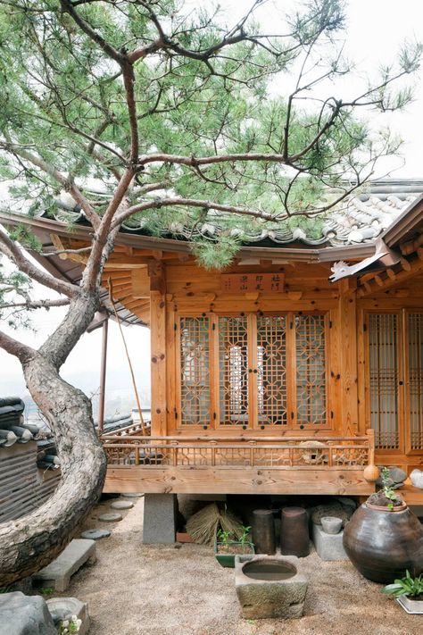 In Seoul, Two Hanoks Make a Modern Home - The New York Times Architecture, Hanok House, Traditional Korean, Ny Times, Pergola, Outdoor Structures, Cabin, House Styles, Building