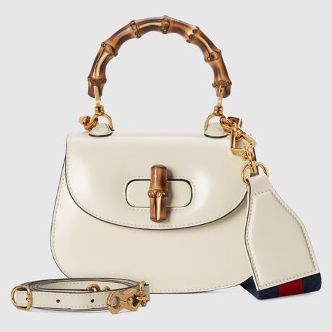 Shop the Gucci Bamboo 1947 mini top handle bag in white at GUCCI.COM. Enjoy Free Shipping and Complimentary Gift Wrapping. Gucci Bamboo 1947, Gucci Bamboo Bag, Mini Top Handle Bag, Gucci Mini, Bamboo Bag, Mini Top, Gucci Bamboo, Classic Bags, Mini Tote Bag